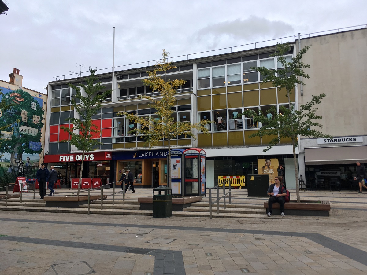 nicely proportioned concrete building with coloured squares