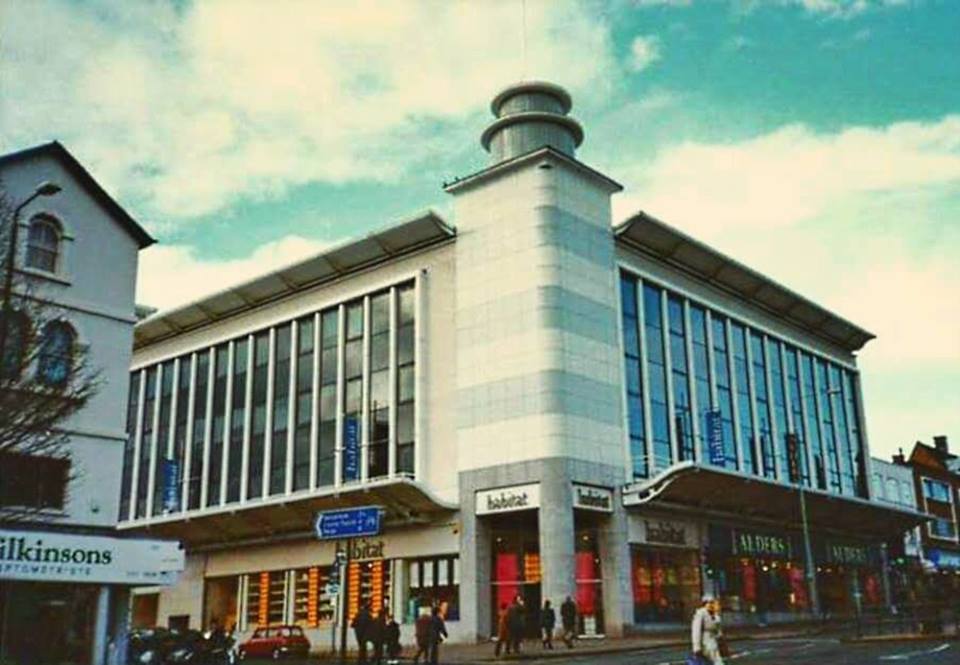 Corner plot with striking building with square turret.